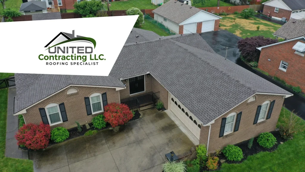 Aerial view of a residential house where a completely new roof is clearly visible, suggesting recent renovation or construction.