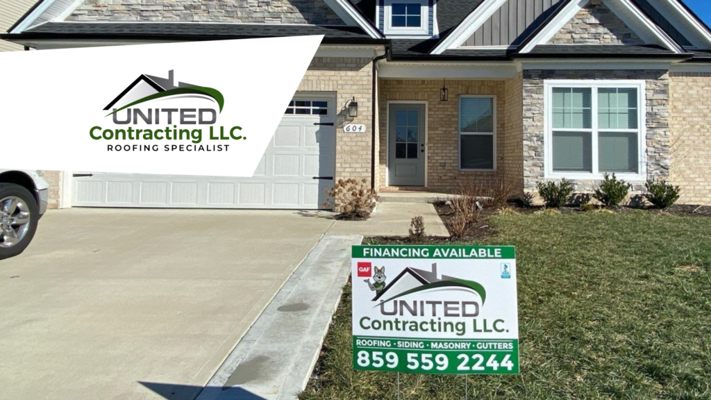 View of a residential house displaying a sign for the company United Contracting, indicating that remodeling or construction work is being carried out on the property.