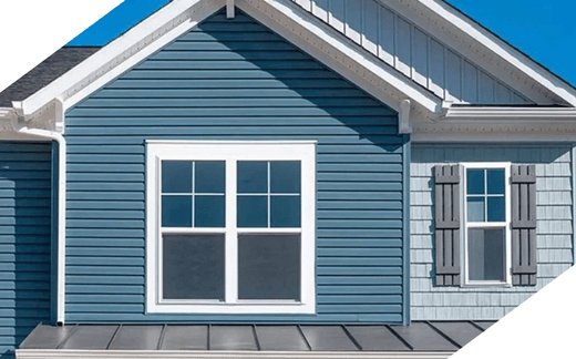 Exterior of a house showcasing siding.
